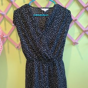 Black Romper with White Triangles.